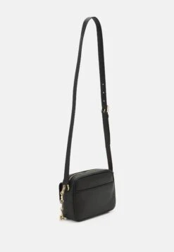 MICHAEL Michael Kors Parker Swag Camera Xbody - Schoudertas - Black -Farfetch Winkel 03e043d1769e4617a19c6a6acc51416d
