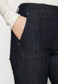 MICHAEL Michael Kors Pant - Bootcut Jeans - Indigo Rinse -Farfetch Winkel 05d82978a03f48e789a6ef9a41b965e7