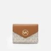 MICHAEL Michael Kors Greenwich Trifold - Portemonnee - Vanilla -Farfetch Winkel 11634c7cbbdc42309a6cb60e51e4029a