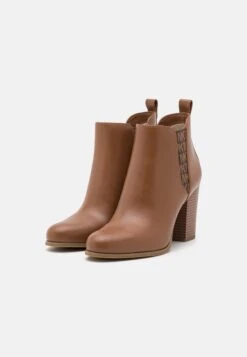 MICHAEL Michael Kors Evaline Heeled - Enkellaarsjes Met Hoge Hak - Luggage 11 MICHAEL Michael Kors Evaline Heeled - Enkellaarsjes Met Hoge Hak - Luggage -Farfetch Winkel 12b4c88a022347028d8c6b1e0fedc94f