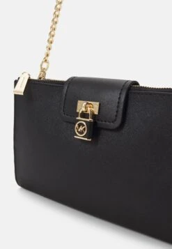 MICHAEL Michael Kors Ruby Zip Xbody - Clutch - Black -Farfetch Winkel 16f4949ac10248c08110c8e6f0c1441b