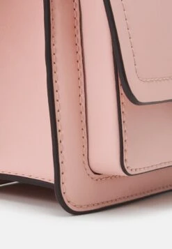 MICHAEL Michael Kors Heather Xs Xbody - Schoudertas - Pink -Farfetch Winkel 18edac9117a444fab0675785a500543b