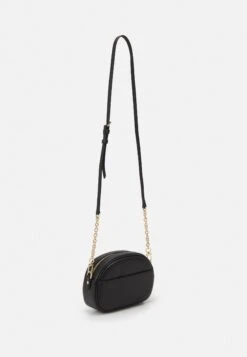 MICHAEL Michael Kors Jet Set Charm Oval Xbody - Schoudertas - Black -Farfetch Winkel 1a9bb5947a634a078f30f0e96e044726