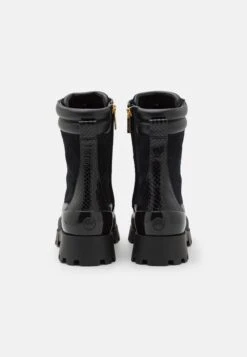 MICHAEL Michael Kors Rowan- Enkellaarsjes Met Plateauzool - Black 11 MICHAEL Michael Kors Rowan- Enkellaarsjes Met Plateauzool - Black -Farfetch Winkel 1f70ca2f6b0d478696d7213603266ffd