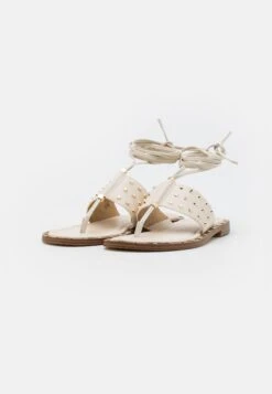 MICHAEL Michael Kors Jagger Flat - Teensandalen - Light Cream -Farfetch Winkel 21991557c4494f6fad220ee2e097b04c