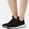 MICHAEL Michael Kors Bodie Slip On - Sneakers Laag - Black -Farfetch Winkel 2279d2ff2fcc414f85feb510fcbc84f9
