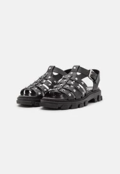 MICHAEL Michael Kors Jagger Fisherman- Sandalen - Black -Farfetch Winkel 4492af70360c49f49bfc725f2a140356