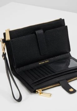 MICHAEL Michael Kors Jet Wristlet - Portemonnee - Black -Farfetch Winkel 458284377082474aa2881ec4a7020a31