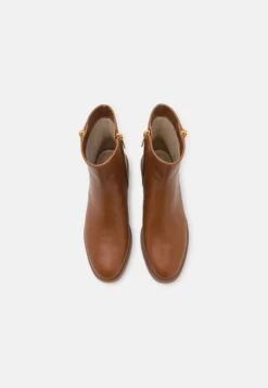 MICHAEL Michael Kors Regan- Korte Laarzen - Luggage -Farfetch Winkel 4e12c2a17e3c42b88c57cd1fb3e86772