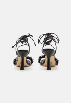 MICHAEL Michael Kors Lucia - Sandalen - Black -Farfetch Winkel 5d82ae20b81f45528966817760ab75b9