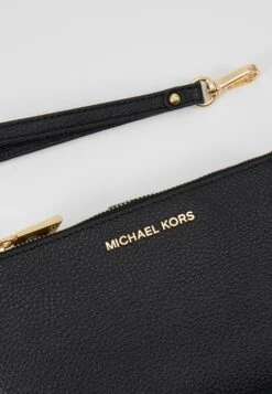 MICHAEL Michael Kors Jet Wristlet - Portemonnee - Black -Farfetch Winkel 6338ab6c0c7747cbb2aef7d40301a3ed