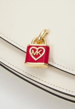 MICHAEL Michael Kors Mila Chain Sling - Schoudertas - Beige -Farfetch Winkel 65dce65e3a8444a1a6e60ab6b8f9bb09