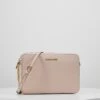 MICHAEL Michael Kors Jet Set Travel Crossbody - Schoudertas - Soft Pink -Farfetch Winkel 721eb310f2e94e958883f0c51865f168