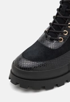 MICHAEL Michael Kors Rowan- Enkellaarsjes Met Plateauzool - Black 13 MICHAEL Michael Kors Rowan- Enkellaarsjes Met Plateauzool - Black -Farfetch Winkel 74e44b5604424367aacda4342f73614e