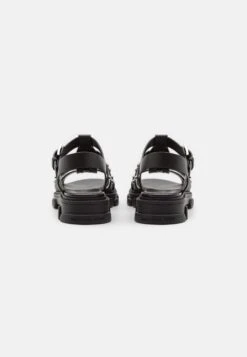 MICHAEL Michael Kors Jagger Fisherman- Sandalen - Black -Farfetch Winkel 7d67f206bc454c1cbb73492b8be2a7f9
