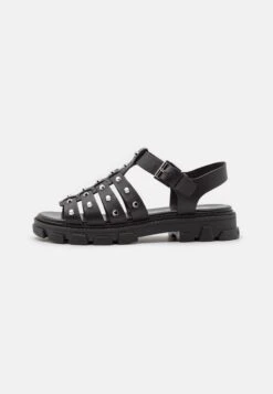 MICHAEL Michael Kors Jagger Fisherman- Sandalen - Black -Farfetch Winkel 7e6439d91aeb4178b60dcdc6a8b776ba