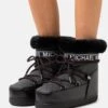 MICHAEL Michael Kors Zelda Bootie - Snowboots- Black -Farfetch Winkel 86c5b6da74cb444daebe43afedd7726e
