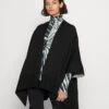 MICHAEL Michael Kors Reversible Logo Poncho - Poncho - Black