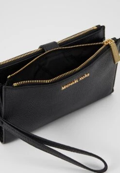 MICHAEL Michael Kors Jet Wristlet - Portemonnee - Black -Farfetch Winkel a727ba51fea64908aaf012f5c6428105