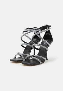MICHAEL Michael Kors Imani Strappy- Sandalen Met Hoge Hak - Black -Farfetch Winkel a8ad5a8961e34d07be09d46df9bfa863