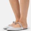 MICHAEL Michael Kors Jessa Flex Flat Mule - Muiltjes - Silver-Coloured 2 MICHAEL Michael Kors Jessa Flex Flat Mule - Muiltjes - Silver-Coloured -Farfetch Winkel b4601832090642bcb3c63f782f86618e