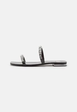 MICHAEL Michael Kors Jessa Flat- Muiltjes - Black -Farfetch Winkel b4a554629b394f338c3e52183d98a87a