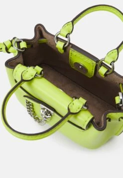 MICHAEL Michael Kors Hamilton Legacy Micro Xbody - Handtas - Limeade -Farfetch Winkel b4f550e280314b46856246a9672489ed