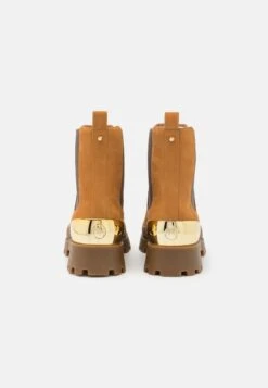 MICHAEL Michael Kors Rowan - Enkellaarsjes Met Plateauzool - Cognac -Farfetch Winkel b67b90d703534bf79c32df416956db07