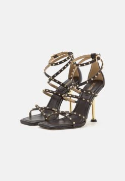 MICHAEL Michael Kors Imani Strappy- Sandalen - Chocolate 11 MICHAEL Michael Kors Imani Strappy- Sandalen - Chocolate -Farfetch Winkel c7ea96a8fd214fd19bfa61f5664e9c3e