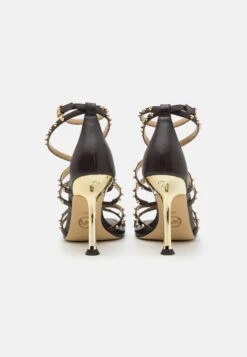 MICHAEL Michael Kors Imani Strappy- Sandalen - Chocolate 12 MICHAEL Michael Kors Imani Strappy- Sandalen - Chocolate -Farfetch Winkel db4cd501fb214c4d8e12deddc2d92d25