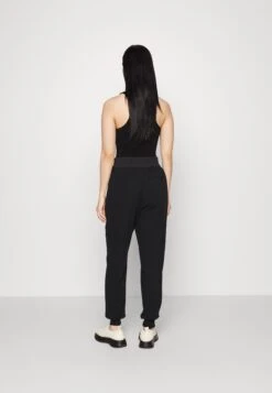 MICHAEL Michael Kors Ponte Mix Jogger - Trainingsbroek - Black 10 MICHAEL Michael Kors Ponte Mix Jogger - Trainingsbroek - Black -Farfetch Winkel e89e22d297bb4729ba3c11f84cf0adba