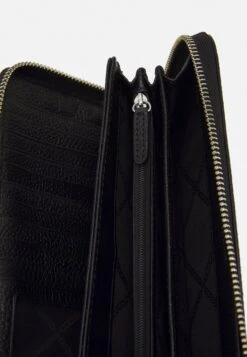 MICHAEL Michael Kors Travel Continental - Portemonnee - Black -Farfetch Winkel f19d823239ff429c86ad1d39fbbe5ed0