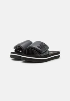 MICHAEL Michael Kors Platform Slide - Muiltjes - Black -Farfetch Winkel f50bc55fb9a24b49819330c0a3963924