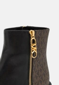 MICHAEL Michael Kors Regan- Korte Laarzen - Black/Brown -Farfetch Winkel f82916fcd79a467ea72058af461c61a3