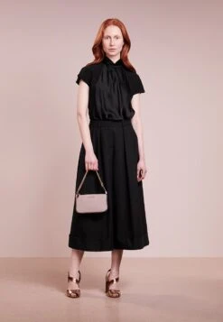 MICHAEL Michael Kors Jet Set Medium Chain Pouchette - Handtas - Soft Pink -Farfetch Winkel fdabfbf0abda45adb036eab08c22627b