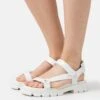 MICHAEL Michael Kors Ridley - Sandalen - Optic White -Farfetch Winkel fefd022275bf44608fe8fc29eec5a7ad